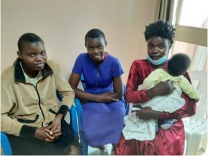 With their mother and young brother