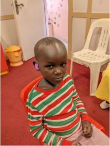 Isma is wearing his new hearing aids