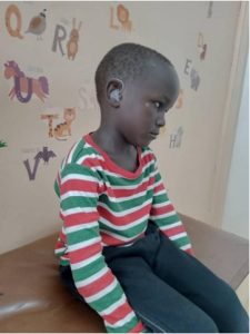 Isma after having his hearing aid fitted